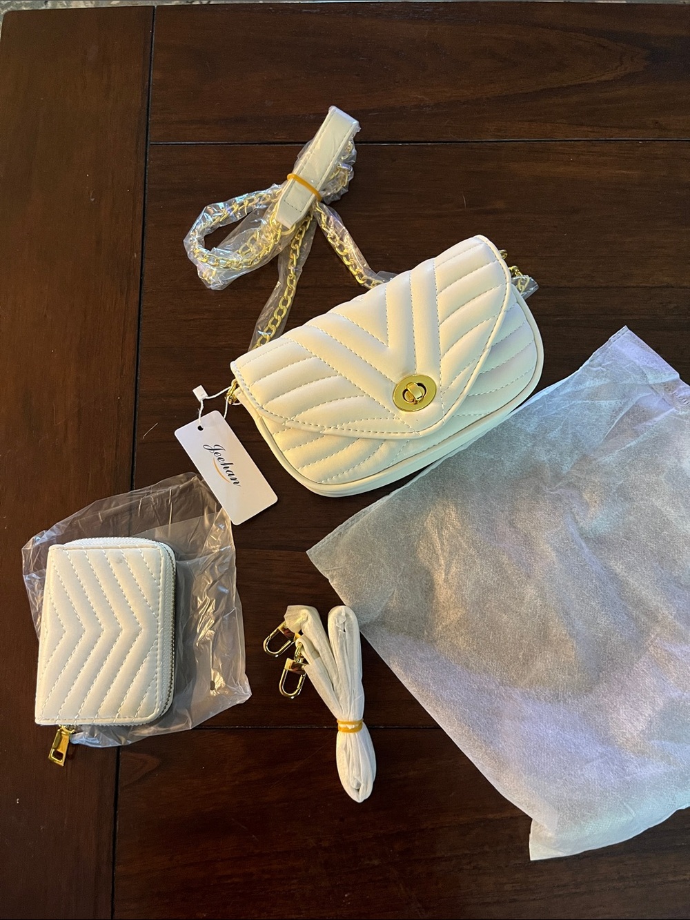 White Quilted Crossbody Bag with Gold Turn-Lock and Chain Strap